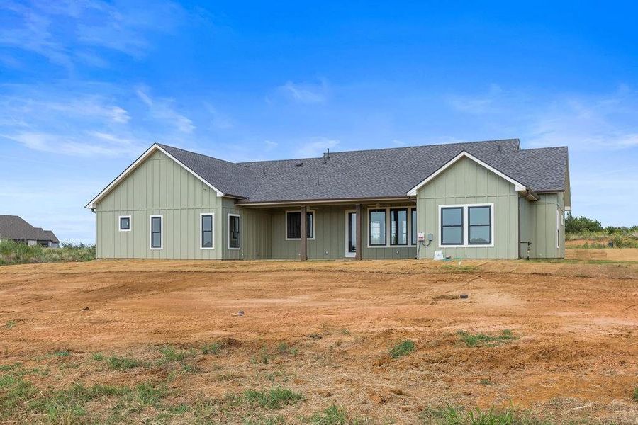 Front exterior of a new home in , Whitesboro, TX, highlighting curb appeal (Image 23).