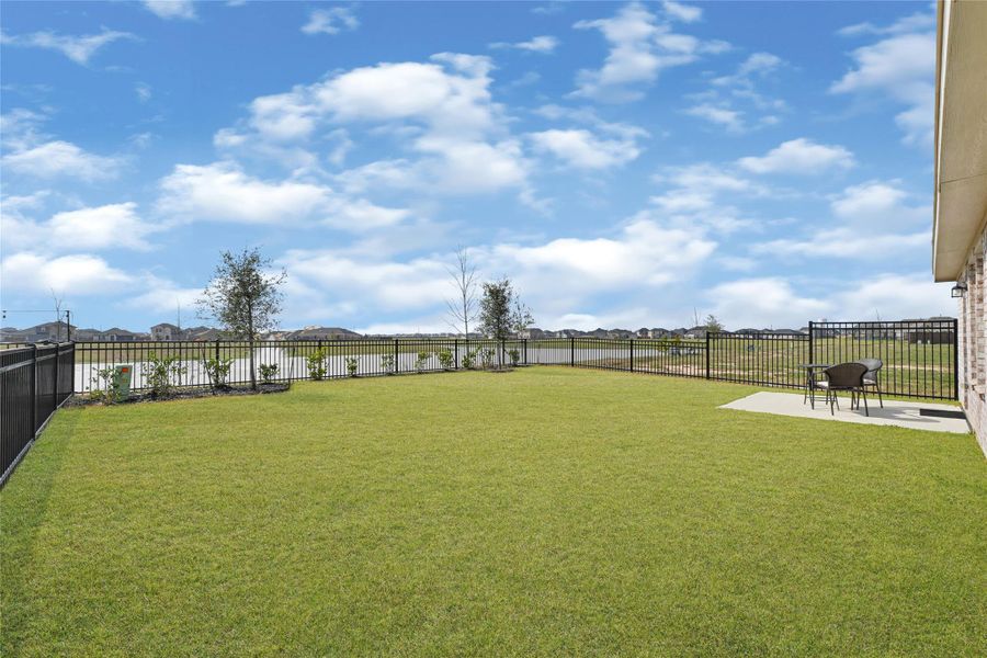 Exterior details and patio area of a home in Sunterra, Katy (Image 26). Exterior details and patio area of a home in Sunterra, Katy (Image 26).