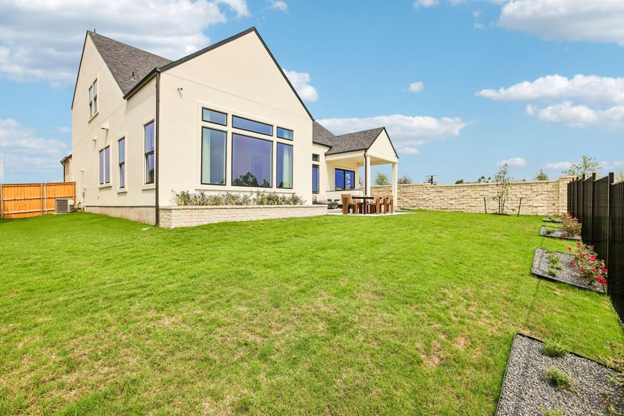 Representative exterior details of a home built from the 5051 by Risewell Homes in Freedom at Anthem, Kyle (Image 4).