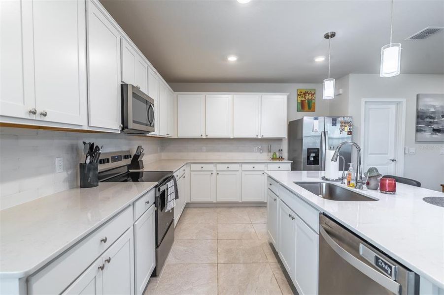 Furnished interior view inside a new home in , St. Cloud (Image 7).