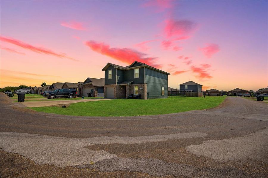 Front exterior of a new home in , Mabank, TX, highlighting curb appeal (Image 1).