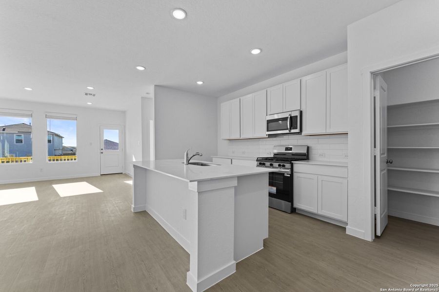 Furnished interior view inside a new home in , New Braunfels (Image 5).