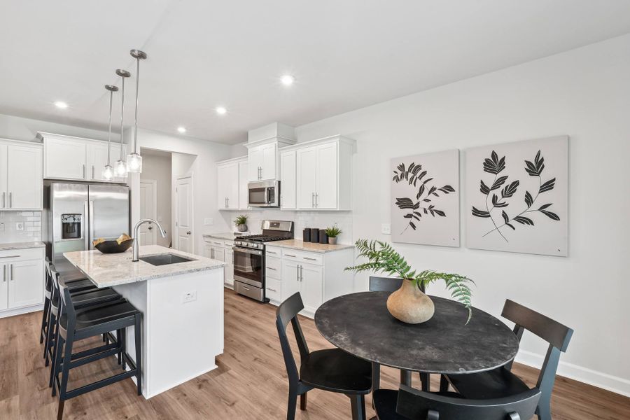 Representative furnished interior of a home built from the Eno by Tri Pointe Homes in Tredenham, Durham (Image 5).