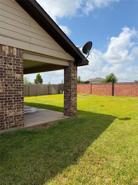 Exterior details and patio area of a home in Sunterra, Katy (Image 26). Exterior details and patio area of a home in Sunterra, Katy (Image 26).
