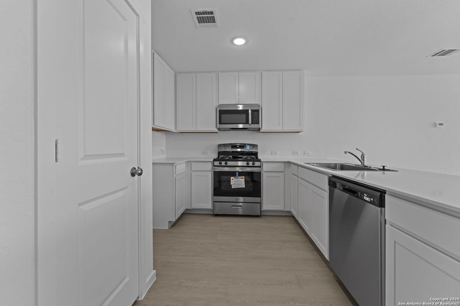 Furnished interior view inside a new home in , New Braunfels (Image 4). Furnished interior view inside a new home in , New Braunfels (Image 4).