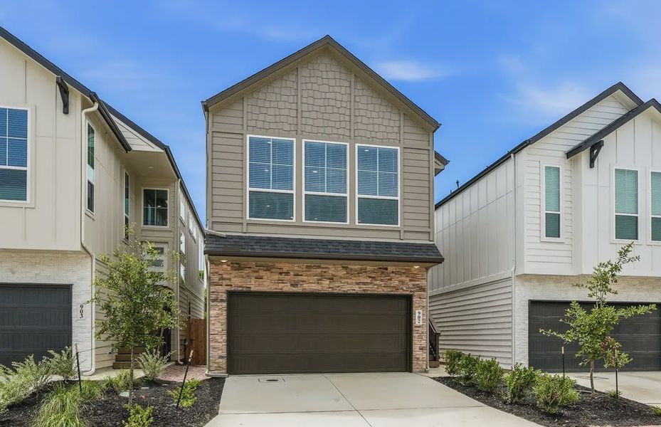 Front exterior of a new home in Rose Hill, San Antonio, TX, highlighting curb appeal (Image 23).