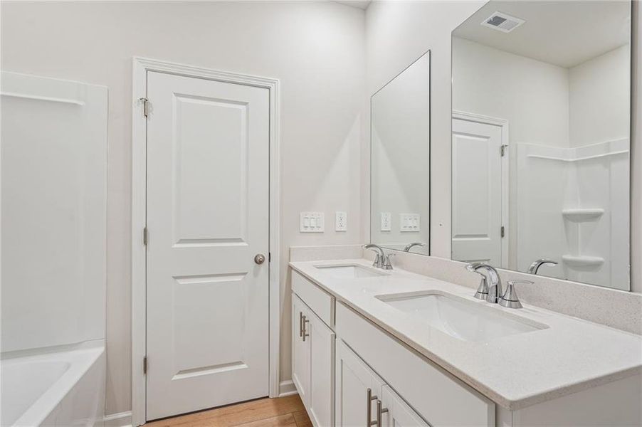 Furnished interior view inside a new home in Northwoods at Mirror Lake, Villa Rica (Image 15).