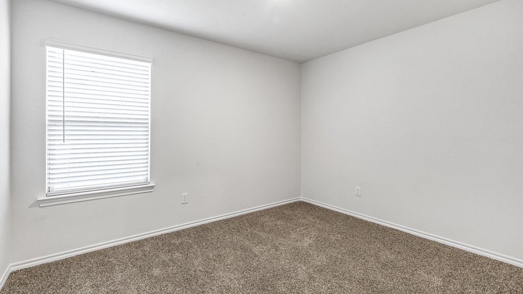 Spacious, unfurnished interior of a new home in Stonewyck Farms, Ennis (Image 17).