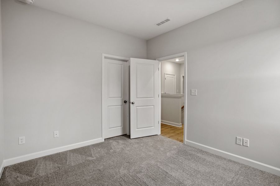 Spacious, unfurnished interior of a new home in Sweetbrier, Durham (Image 28).