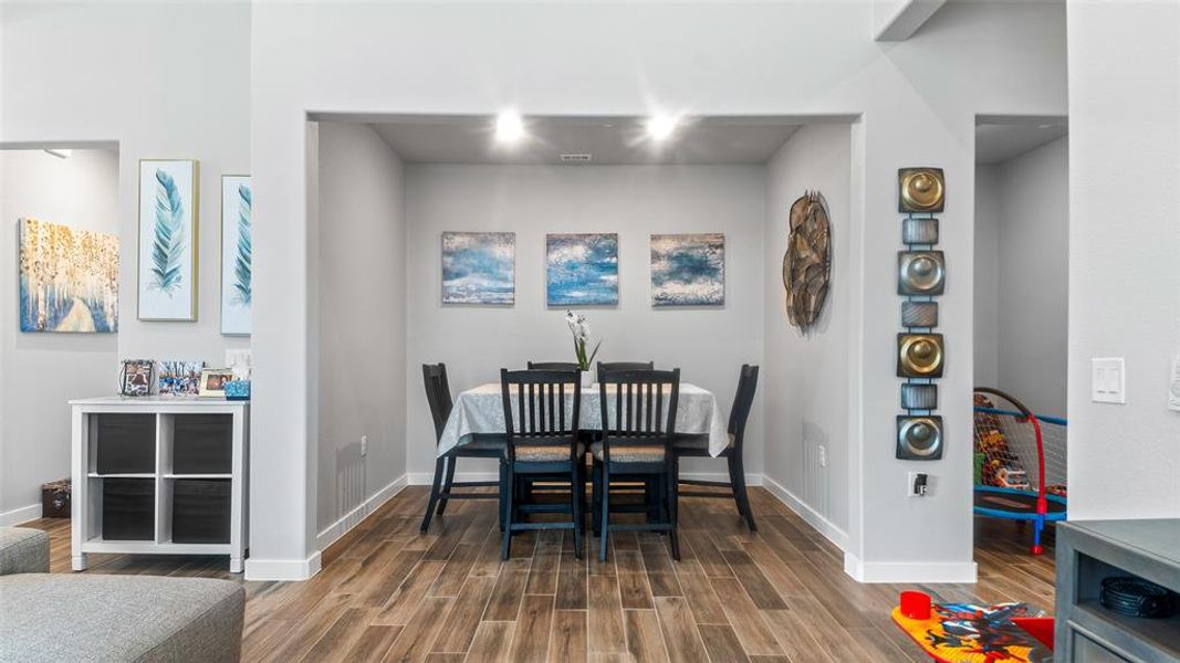 Dining area featuring hardwood / wood-style flooring