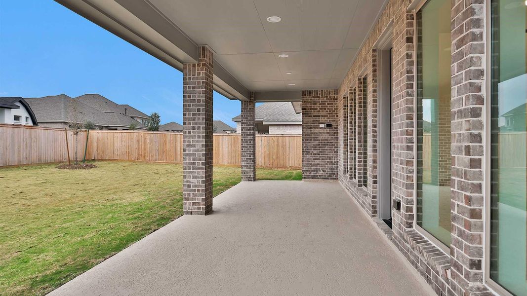 Exterior details and patio area of a home in Bridgeland, Cypress (Image 15). Exterior details and patio area of a home in Bridgeland, Cypress (Image 15).