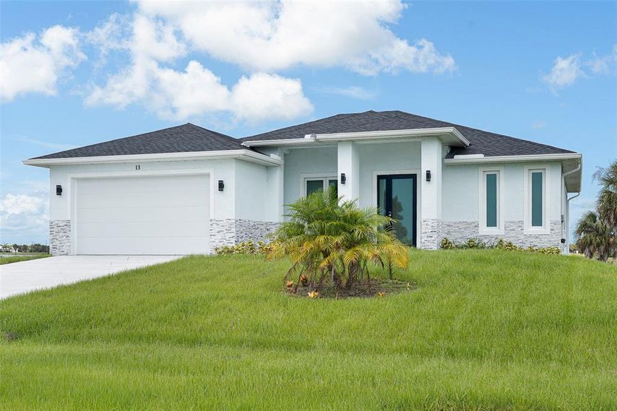 Front exterior of a new home in , Placida, FL, highlighting curb appeal (Image 27).