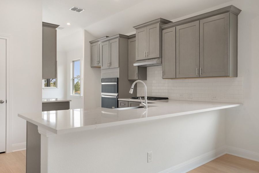 Furnished interior view inside a new home in Sage Hollow, Kyle (Image 4). Furnished interior view inside a new home in Sage Hollow, Kyle (Image 4).