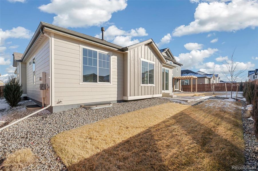 Exterior details and patio area of a home in Farmlore, Brighton (Image 3).