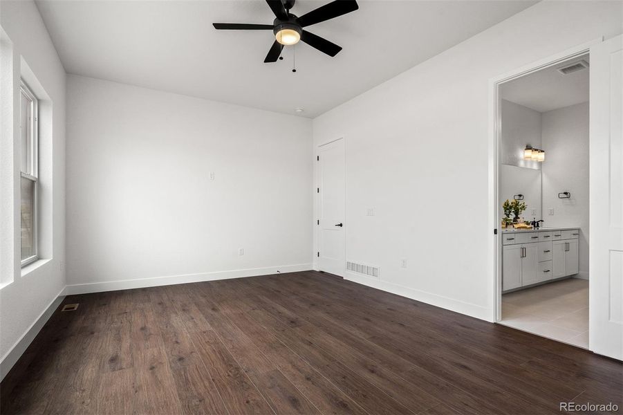 Spacious, unfurnished interior of a new home in Wolf Ranch - Enclave Collection, Colorado Springs (Image 19).