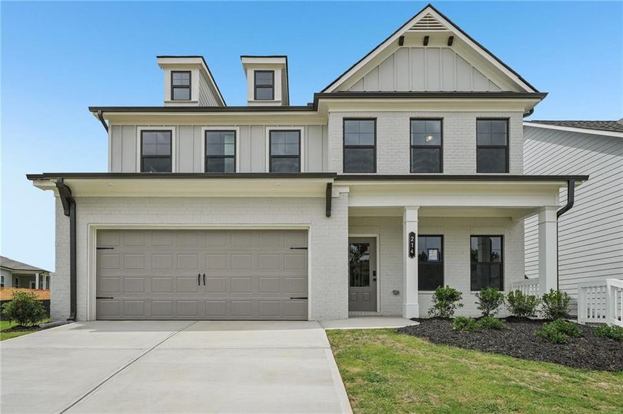 Front exterior of a new home in Fowler Farms, Auburn, GA, highlighting curb appeal (Image 1). Front exterior of a new home in Fowler Farms, Auburn, GA, highlighting curb appeal (Image 1).