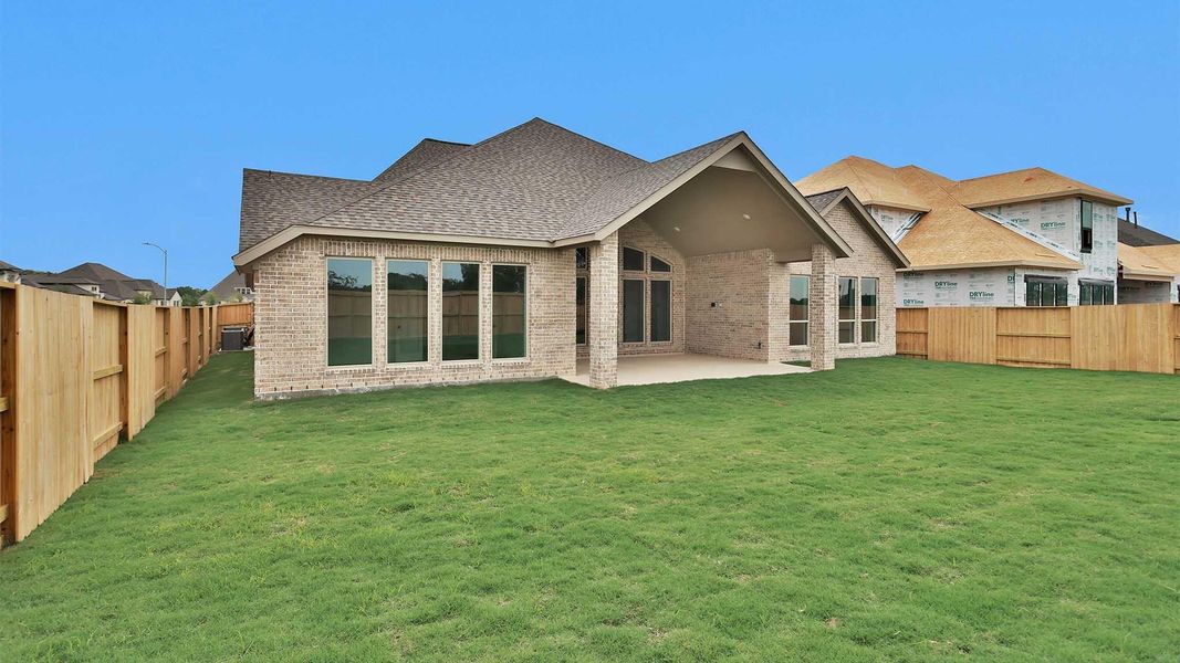 Exterior details and patio area of a home in Meridiana, Manvel (Image 2). Exterior details and patio area of a home in Meridiana, Manvel (Image 2).