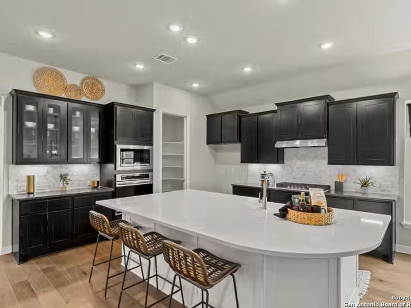 Furnished interior view inside a new home in Potranco Oaks, Castroville (Image 16).