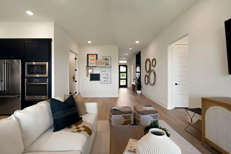 Furnished interior view inside a new home in Lagos Reserve, Manor (Image 11).