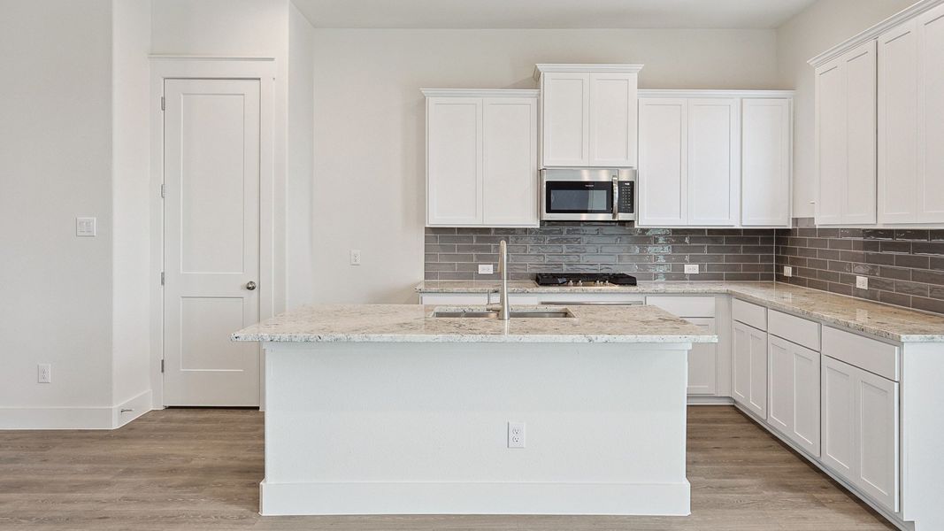 Representative furnished interior of a home built from the Reese by DRB Homes in Collin Creek, Plano (Image 14).