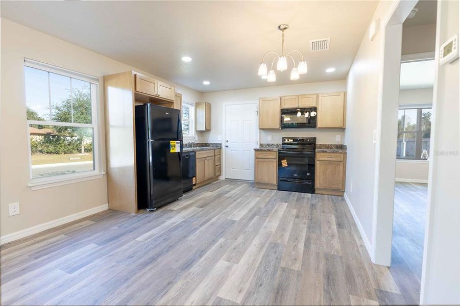 Furnished interior view inside a new home in , Tavares (Image 5).