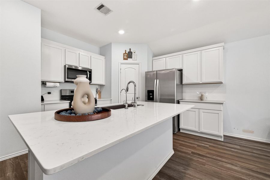 Furnished interior view inside a new home in Sunterra, Katy (Image 10).