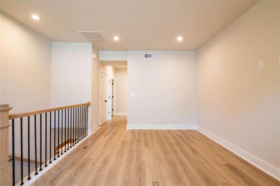 Spacious, unfurnished interior of a new home in The Paddocks at Doc Hughes, Buford (Image 27).