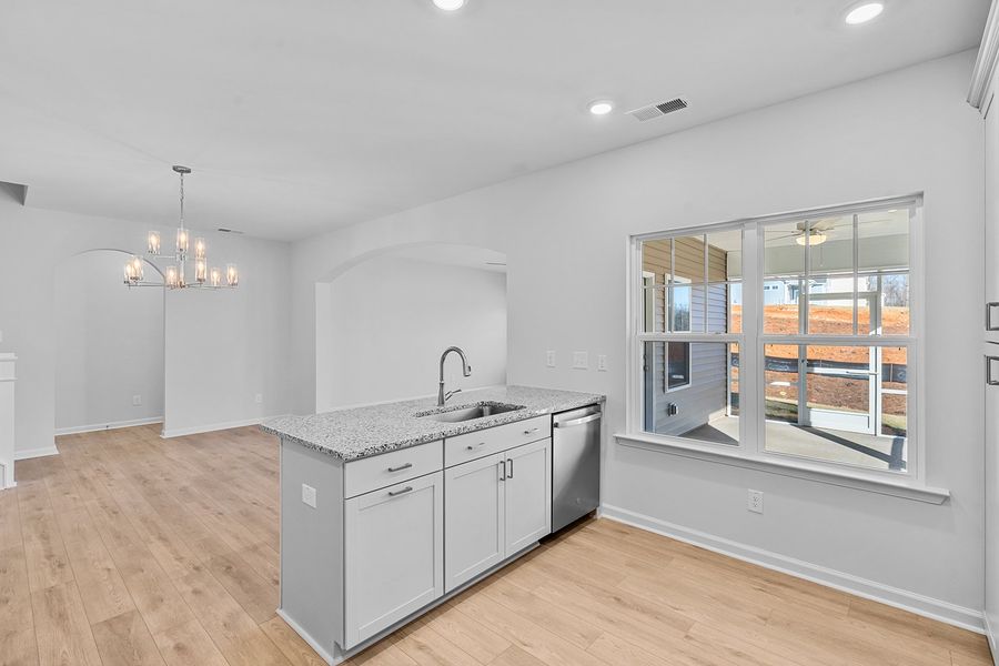 Furnished interior view inside a new home in Brayden, Advance (Image 9).