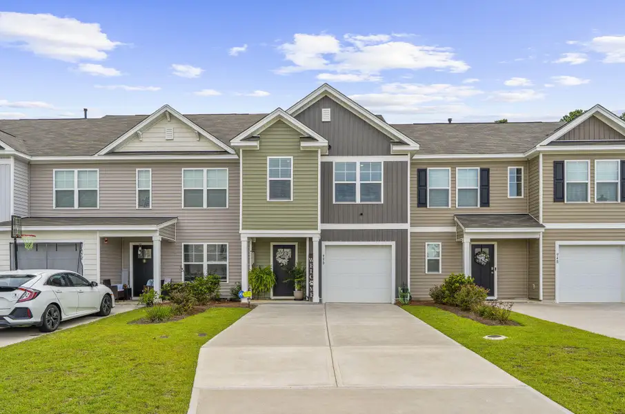 Front exterior of a new home in , Summerville, SC, highlighting curb appeal (Image 1). Front exterior of a new home in , Summerville, SC, highlighting curb appeal (Image 1).