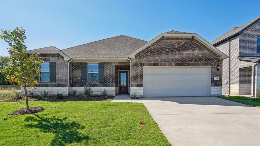 Front exterior of a new home in Windmore, Princeton, TX, highlighting curb appeal (Image 1). Front exterior of a new home in Windmore, Princeton, TX, highlighting curb appeal (Image 1).