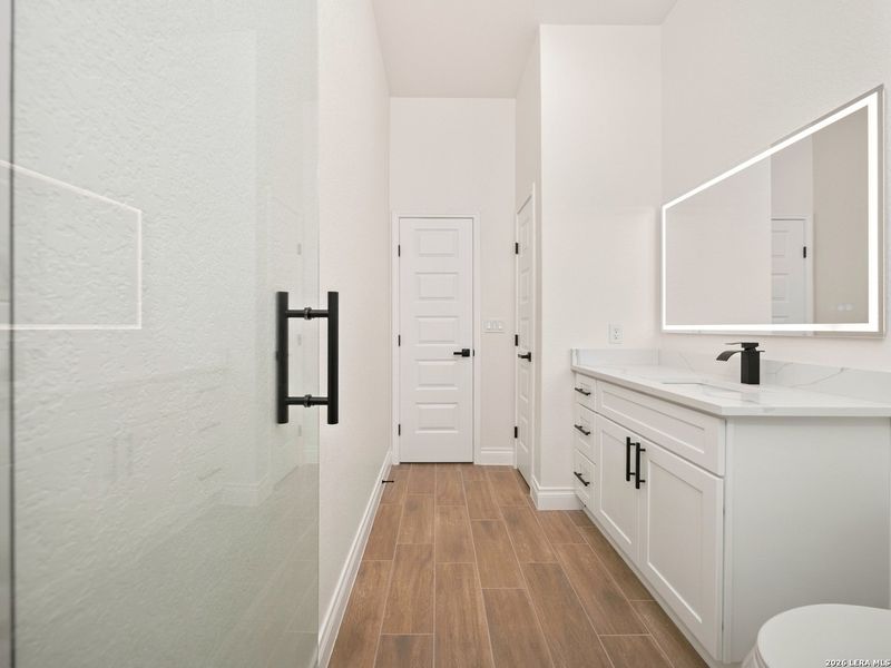 Furnished interior view inside a new home in , Elmendorf (Image 42).