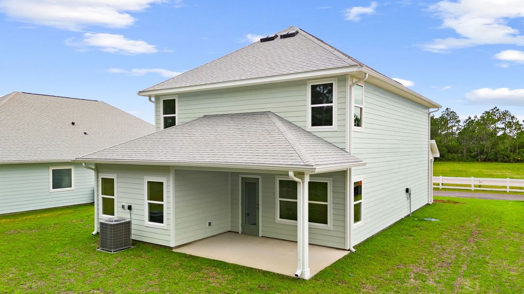 Exterior details and patio area of a home in Buffer Farms, Port Saint Joe (Image 3).