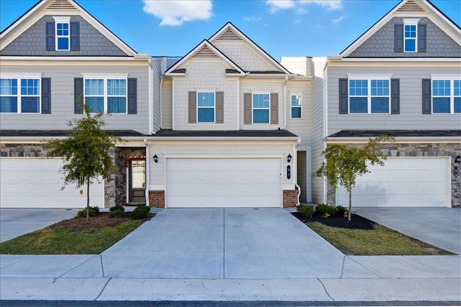 Front exterior of a new home in , Jasper, GA, highlighting curb appeal (Image 1).