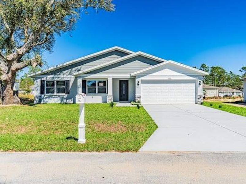 Front exterior of a new home in , Kissimmee, FL, highlighting curb appeal (Image 15). Front exterior of a new home in , Kissimmee, FL, highlighting curb appeal (Image 15).