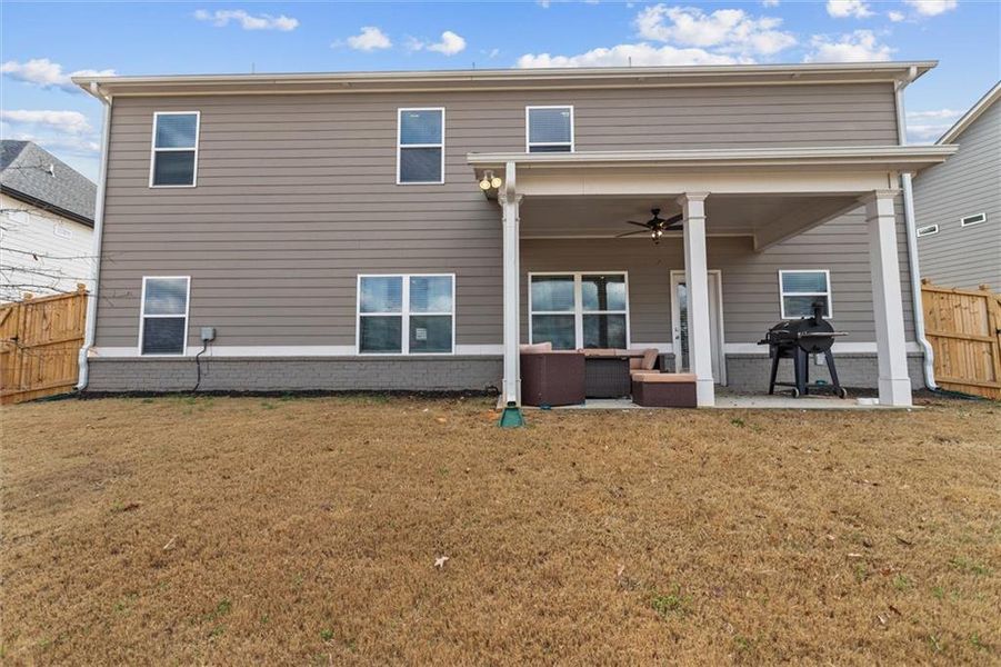 Exterior details and patio area of a home in Enclave at Brookside Crossing, Auburn (Image 29).