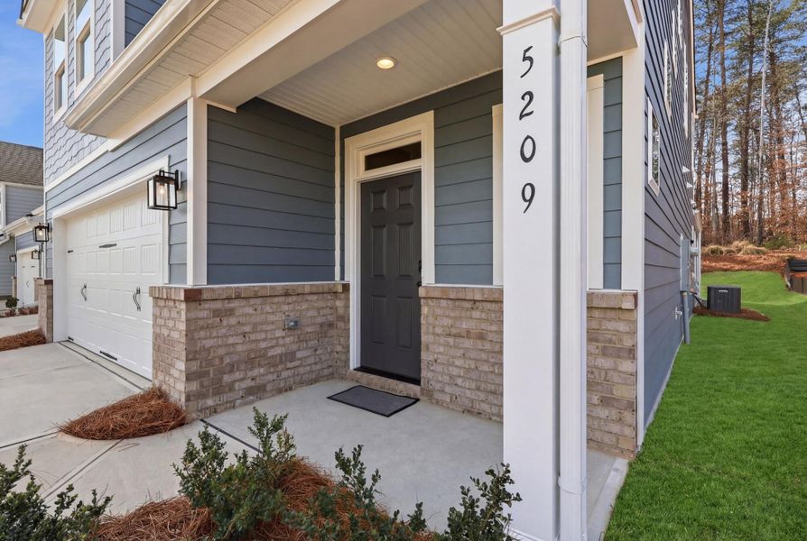 Exterior details and patio area of a home in Harbor Crossing, Greensboro (Image 3).