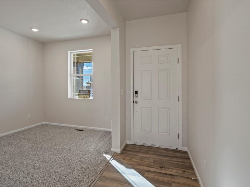 Spacious, unfurnished interior of a new home in Buffalo Highlands: The Flora Collection, Commerce City (Image 3).