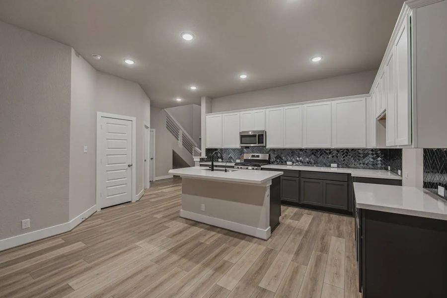 Representative furnished interior of a home built from the Jordy by Chesmar Homes in Stillwater Ranch, Buda (Image 6).