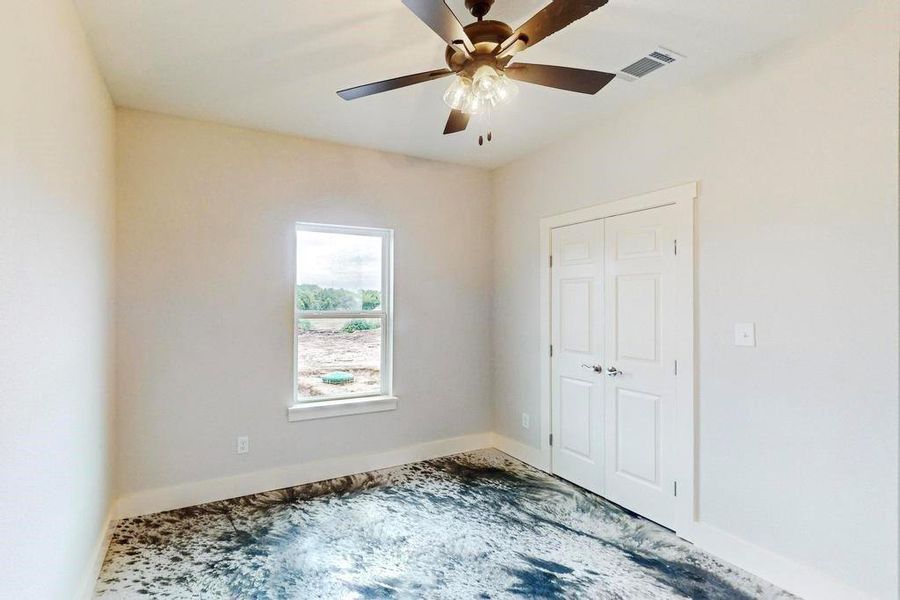 Unfurnished room with ceiling fan