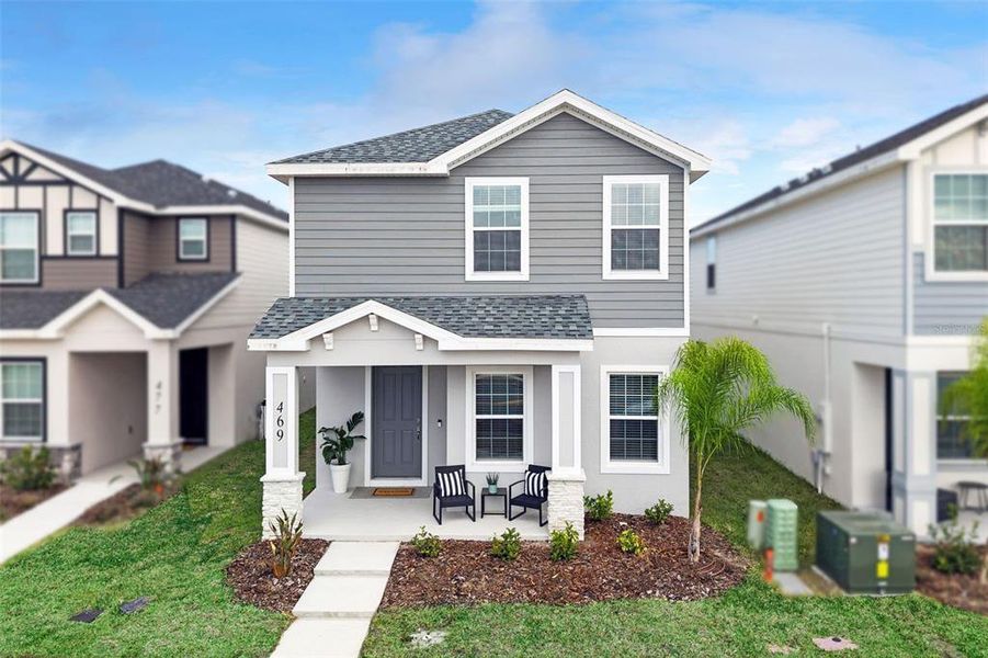 Front exterior of a new home in , St. Cloud, FL, highlighting curb appeal (Image 25).