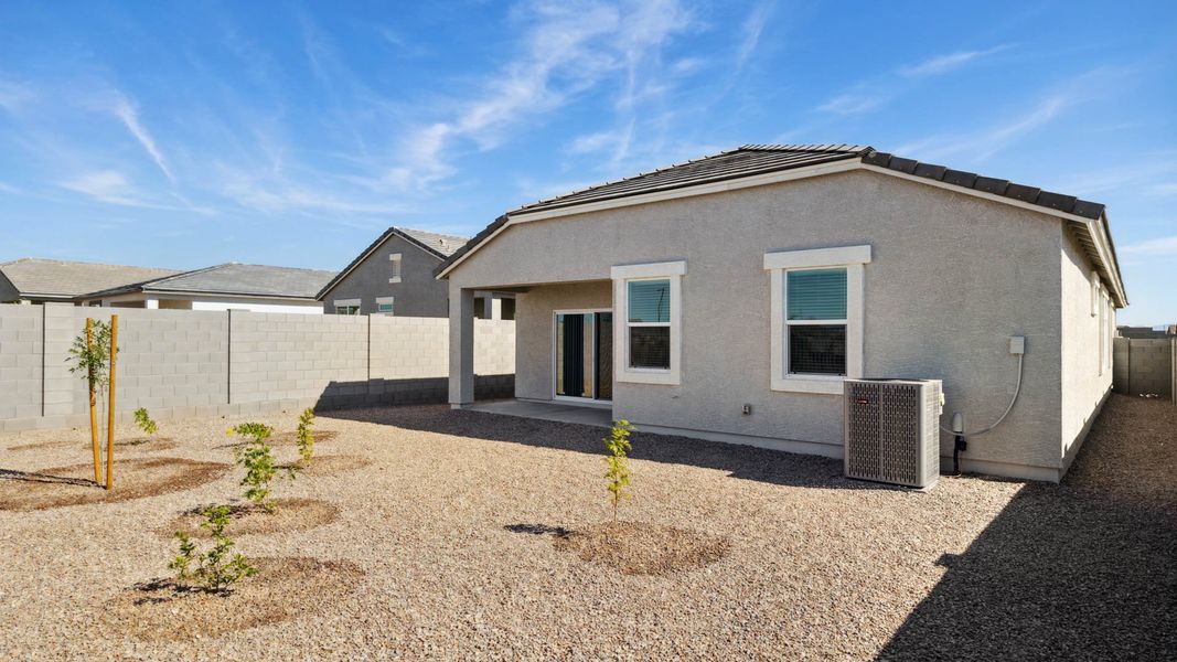 Front exterior of a new home in Copper Falls, Buckeye, AZ, highlighting curb appeal (Image 15).