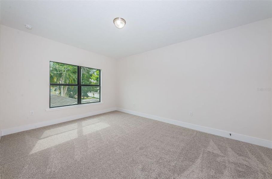 Spacious, unfurnished interior of a new home in , New Port Richey (Image 24).