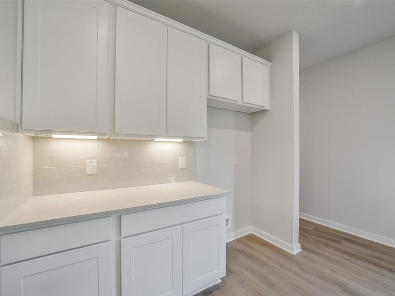 Furnished interior view inside a new home in Caney Creek Place, Conroe (Image 13).