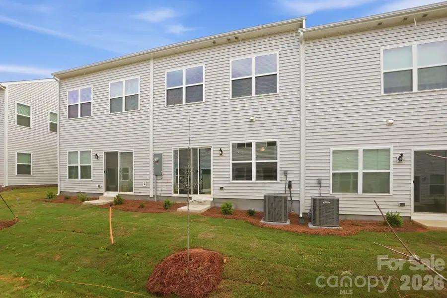Exterior details and patio area of a home in Sloan Station, Charlotte (Image 3).