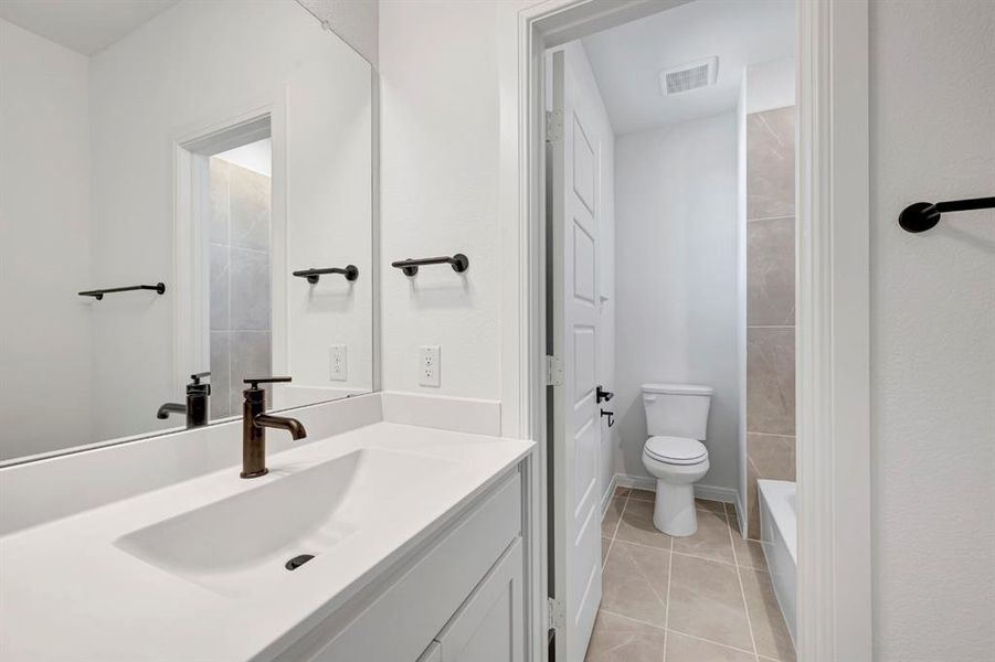 Furnished interior view inside a new home in Painted Tree Woodland West – Village, McKinney (Image 10).