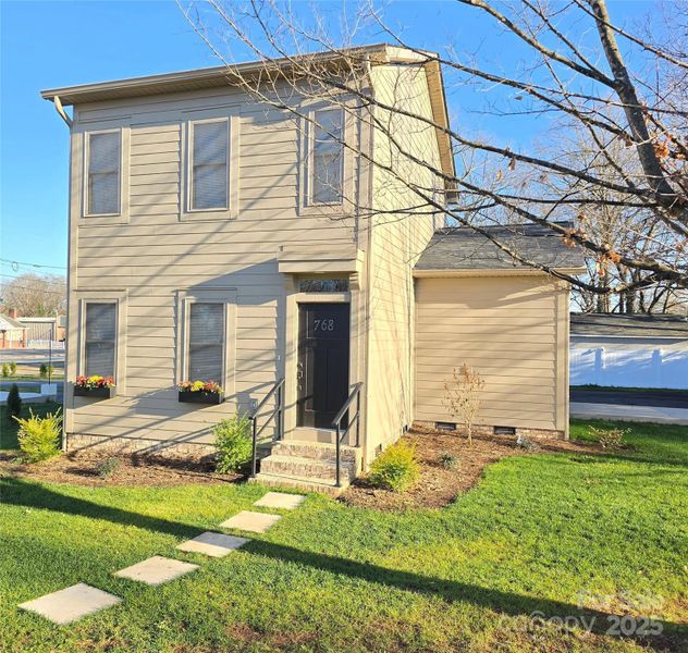 Exterior details and patio area of a home in , Hickory (Image 2).