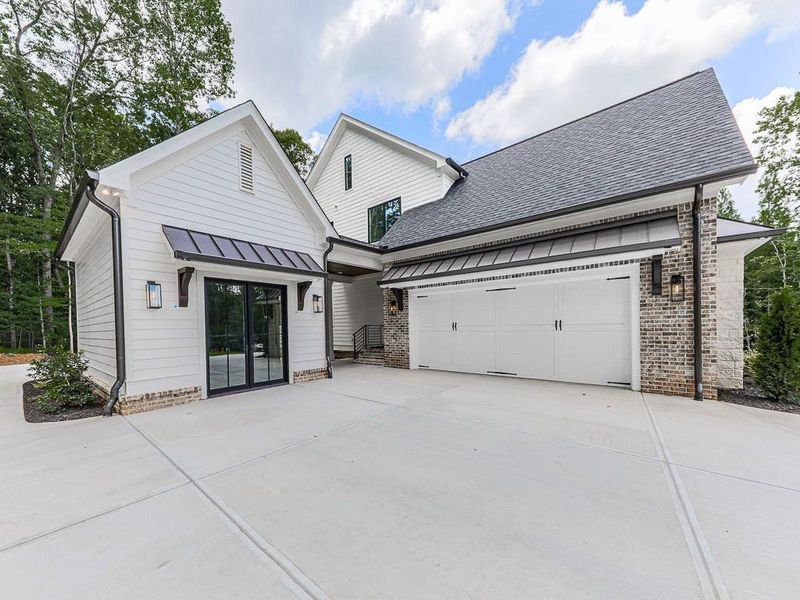 Front exterior of a new home in , Ball Ground, GA, highlighting curb appeal (Image 29).