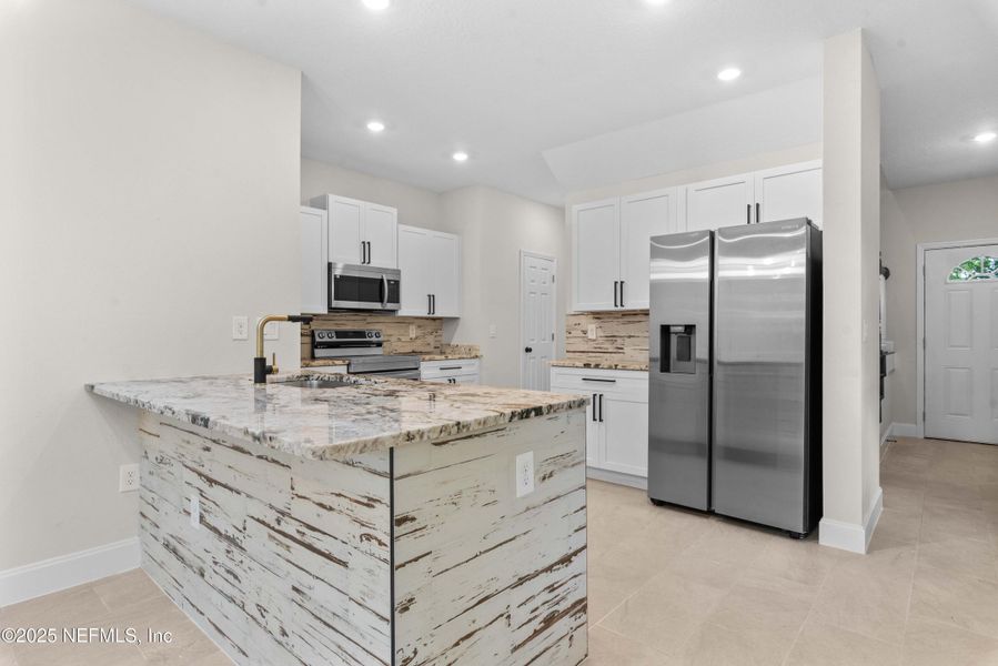 Furnished interior view inside a new home in , Jacksonville (Image 7). Furnished interior view inside a new home in , Jacksonville (Image 7).