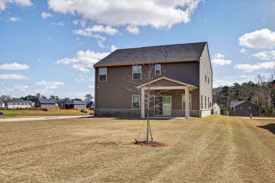 Exterior details and patio area of a home in , McDonough (Image 3).