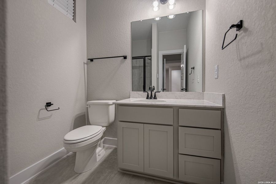 Furnished interior view inside a new home in The Reserve at Potranco Oaks, Castroville (Image 14).